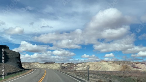 POV road trip through Utah and Arizona along Route 12 and Highway 95, with scenic canyons, mesas, red rocks and desert landscapes. Horizontal and vertical footage.