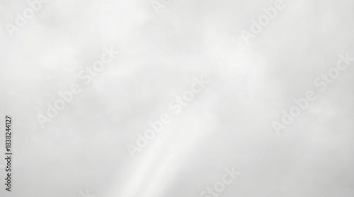 Abstract background with light gray soft cloud dancer color. Subtle texture creating a tranquil and ethereal atmosphere for design.