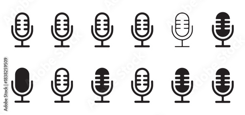 Set of various black and white standing microphones on stands for audio recording