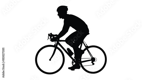 A cyclist riding a road bike in a black silhouette