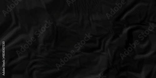 Crumple crushed black paper obsolete rumple craft design. wrinkle ripped creased crumple aged closeup recycled document grunge paper background.	