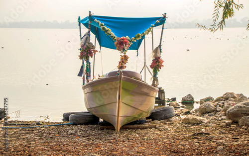 Fototapeta Naklejka Na Ścianę i Meble -  fancy boat pulled ashore