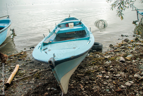 Fototapeta Naklejka Na Ścianę i Meble -  fishing boats on the lake shore