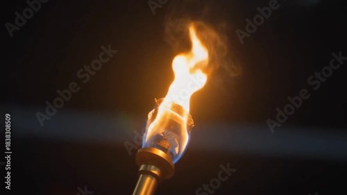 Burning Match Glowing in Dark Flame