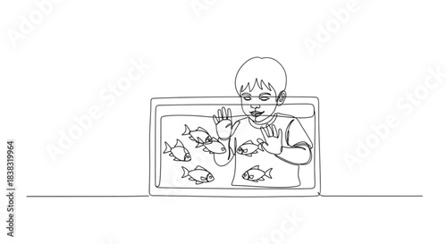 Child watching fish in aquarium with curiosity and excitement  