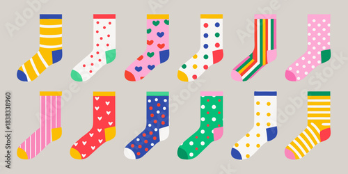 Colorful assorted socks with various patterns displayed on a light gray background