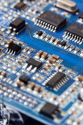 Close-up of electronic circuit board with electronic components. Technology background