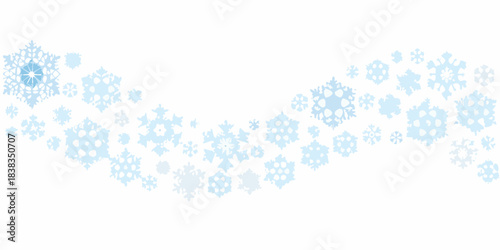 A scattering of delicate blue snowflakes on a clean white background