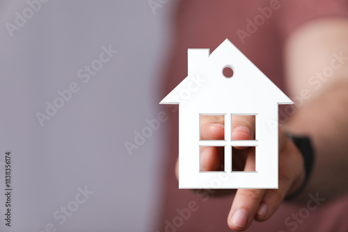 Person presenting a small h...