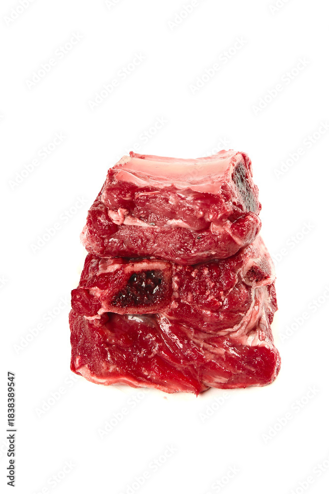 Obraz premium Premium Raw Beef Steaks Stack - Fresh Quality Cuts Isolated