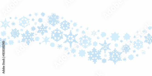 A sweeping pattern of delicate blue snowflakes against a white background