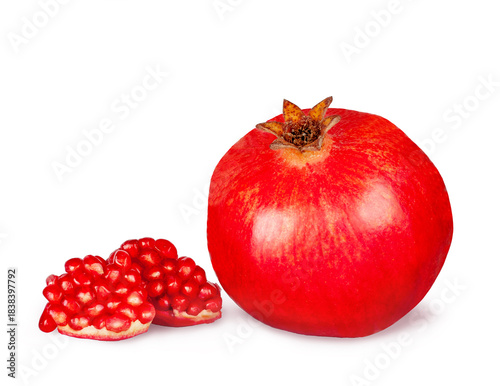 Pomegranate fruit and slices isolated on a white background, contour