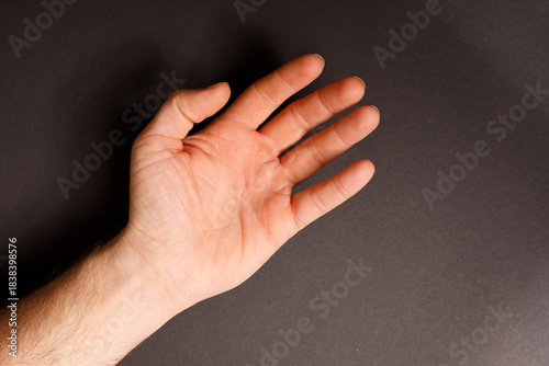 Close-up of a human hand on...