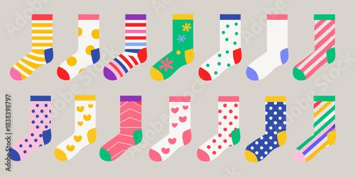 Colorful and patterned socks arranged in rows on a gray background