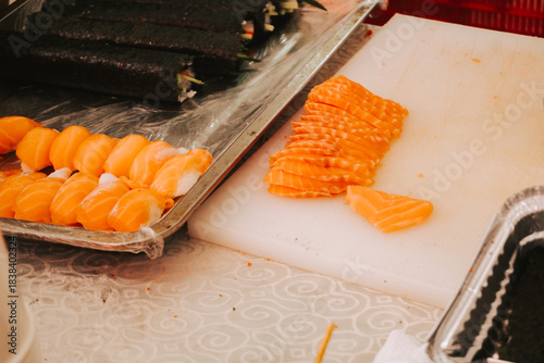 Sliced fresh salmon for sushi and rolls. Fresh sea fish for cooking