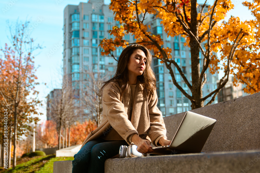 custom made wallpaper toronto digitalWoman Working on Laptop in Autumn Park