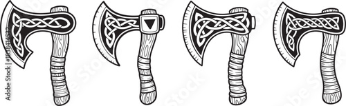 Set of four traditional viking axes with celtic knot patterns on wooden handles