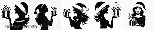 vector silhouette of a woman carrying a Christmas gift