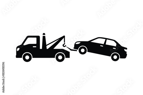 A tow truck with car silhouette vector art illustration