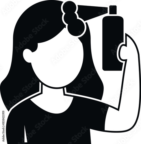 Woman applying hairspray to her styled hair, a concept of beauty and grooming routine