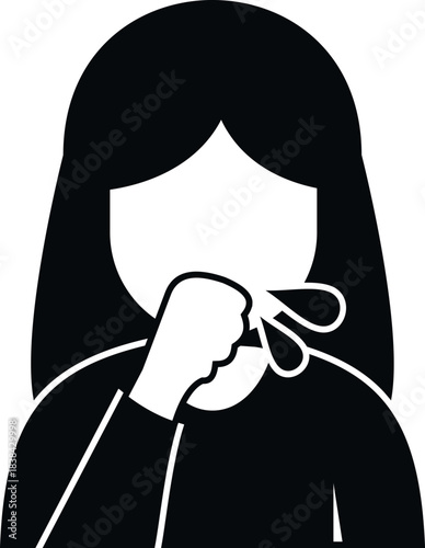 Woman covering mouth while coughing, showing a common sickness symptom