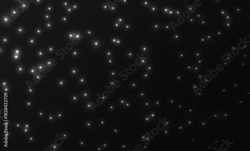 Abstract background of shimmering white particles on a dark gradient perfect for digital overlays festive designs or a cosmic night sky concept