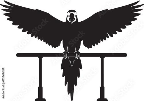 Silhouette of a large parrot with wings spread wide perched on a bar