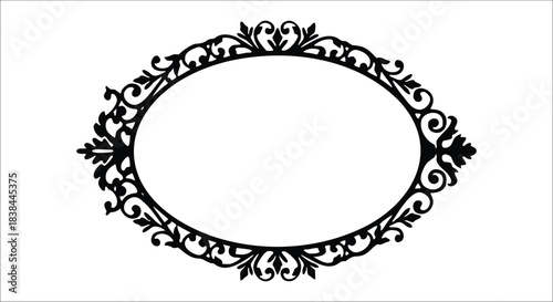 Ornate black oval frame with decorative scrollwork and floral elements Keywords: ornate, frame