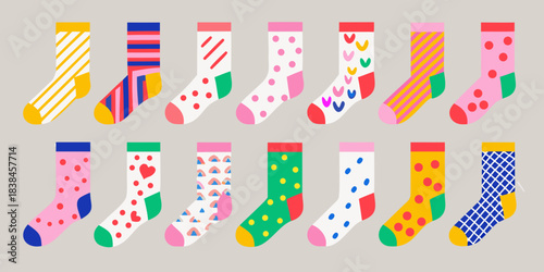 A colorful collection of patterned socks displayed on a light gray background