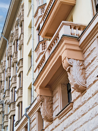 Facade of a historic building with bay windows and balconies