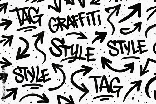 Graffiti design featuring arrows and words on a white background in an urban setting