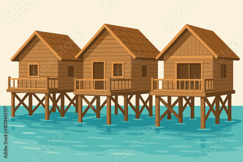 Wooden houses on stilts over water in a coastal setting during the daytime