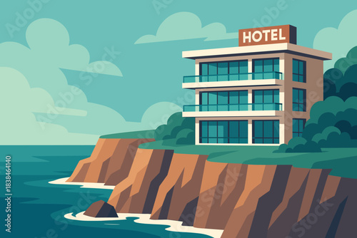 Coastal hotel building on cliffs near ocean with clear blue sky in the background