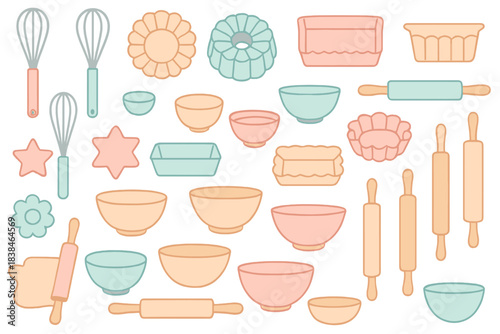 Baking tools and utensils arranged in various shapes and sizes on a flat surface for kitchen activities