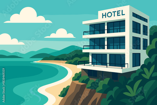 Hotel by the sea with mountains in the background and a sandy shore during daytime