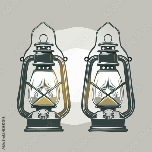 Two vintage kerosene lanterns with glass globes and metal frames