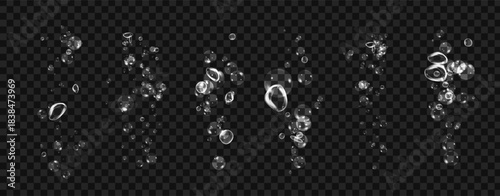 Realistic oxygen bubbles in water on a black background with fizzy sparkles and effervescent style. 