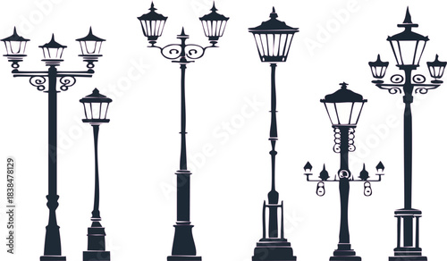Collection of classic ornate street lamps in silhouette against white background