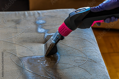 Closeup of upholstered Sofa chemical cleaning