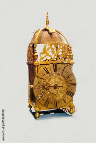 Antique alfalfa clock isolated on a light background. Items watches antiques technologies World tourism.