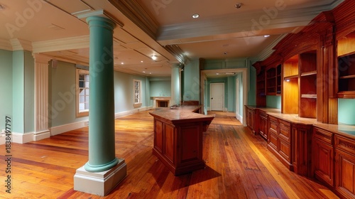 Interior view of an elegant, historic room featuring rich wooden cabinetry and a prominent supporting column.
