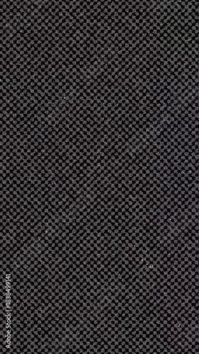 Dark Woven Fabric Texture with Small Repeating Pattern