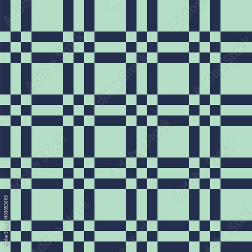 Pattern created from pale green and navy blue squares and navy blue rectangles
