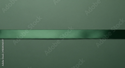 Elegant emerald green satin ribbon stripe on sage matte paper background. Monochromatic luxury texture for Christmas gift, wedding invitation, or premium packaging design