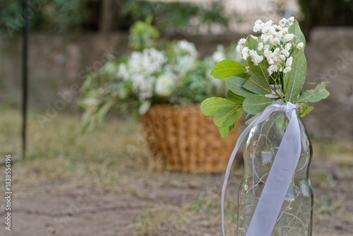Wedding reception floral bottle decoration with fairy lights