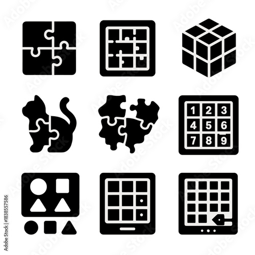 Black and white puzzle icons collection on gray background
