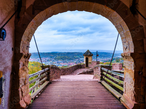 Tableau sur toile View of Eisenach town framed by Wartburg Castle arch, Germany