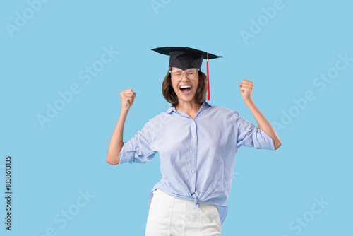 Happy female graduating stu...