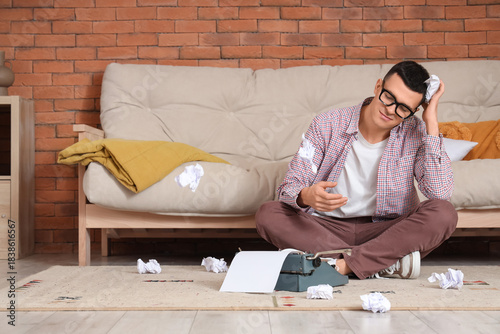 Displeased male author with...