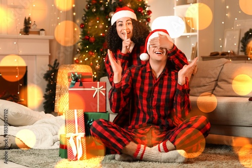 Happy young woman surprisin...
